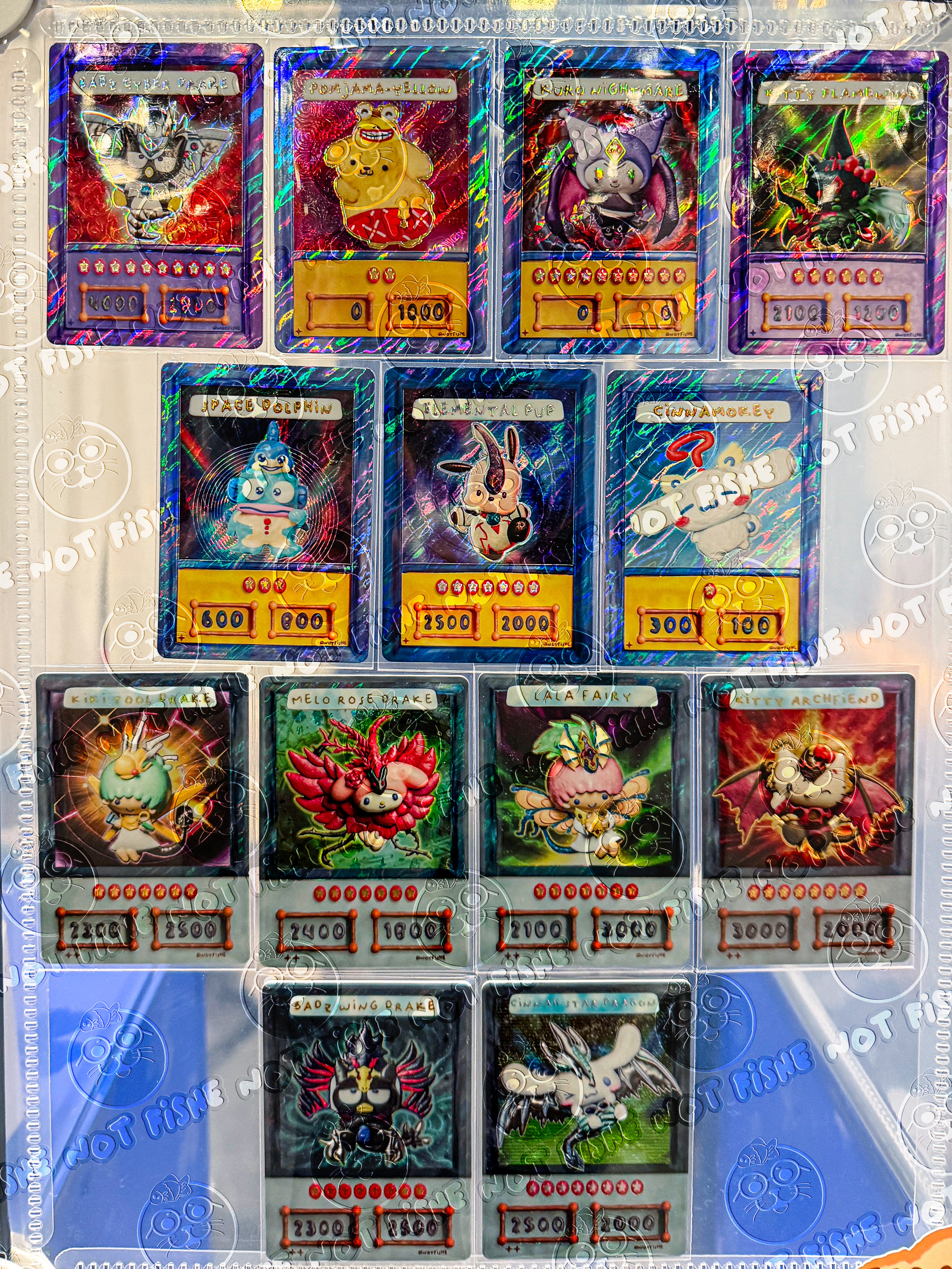 Second binder page of super rare foil cards